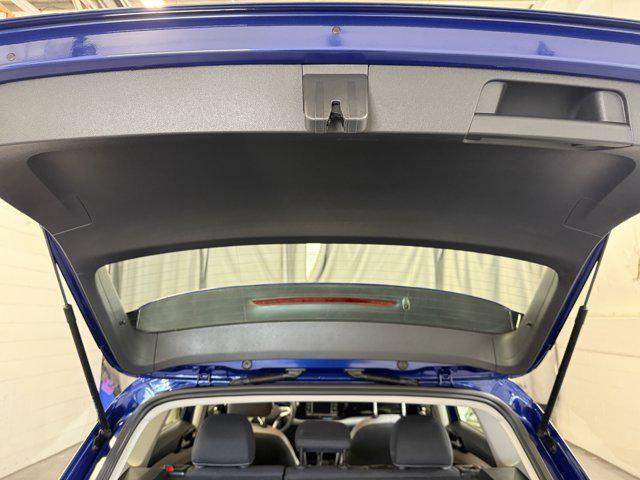 Photo of 2024 Dusk Blue Metallic Volkswagen Taos
