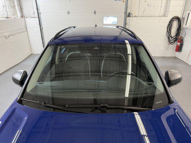 Photo of 2024 Dusk Blue Metallic Volkswagen Taos