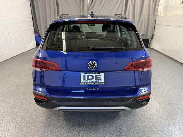 Photo of 2024 Dusk Blue Metallic Volkswagen Taos