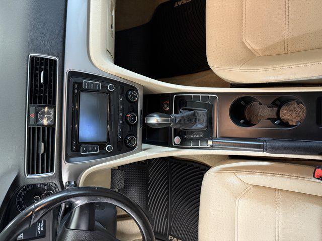 Photo of 2015 Black Uni Volkswagen Passat