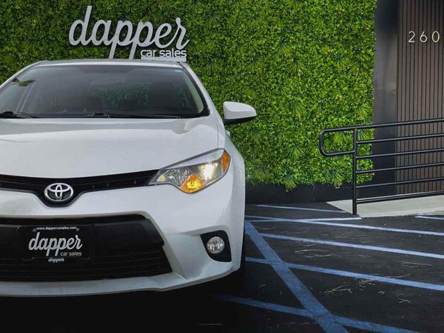 Photo of 2014 Blizzard Pearl Toyota Corolla