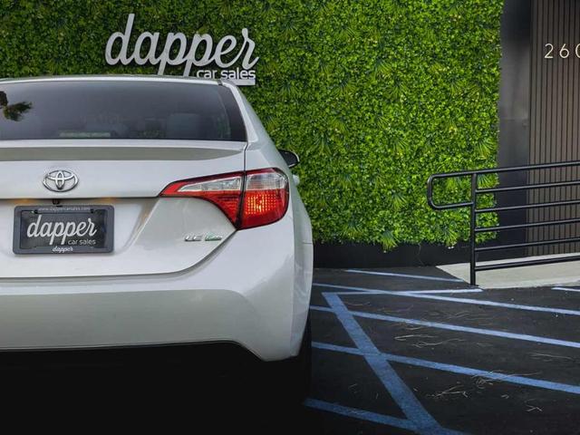 Photo of 2014 Blizzard Pearl Toyota Corolla