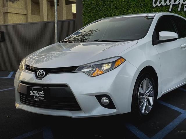 Photo of 2014 Blizzard Pearl Toyota Corolla