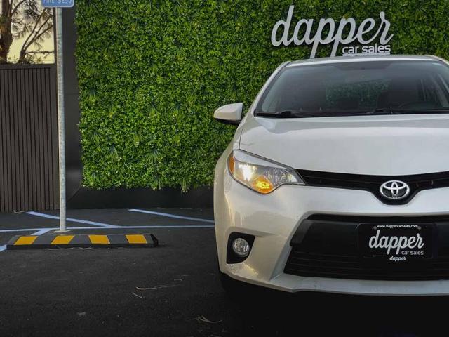 Photo of 2014 Blizzard Pearl Toyota Corolla