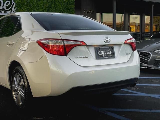 Photo of 2014 Blizzard Pearl Toyota Corolla