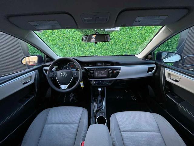Photo of 2014 Blizzard Pearl Toyota Corolla