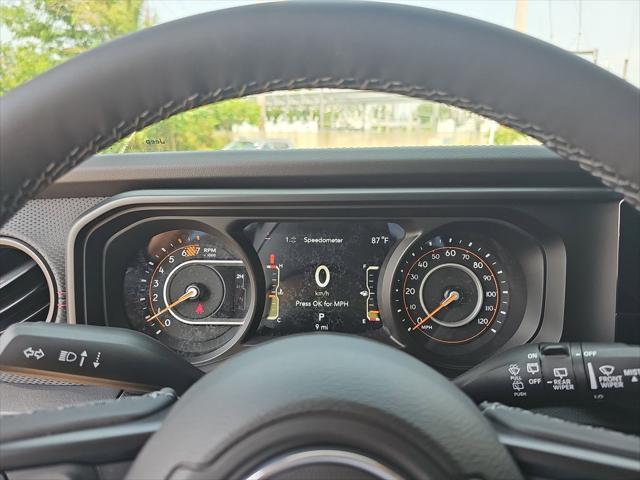 Photo of 2025 Granite Crystal Metallic Clearcoat Jeep Wrangler