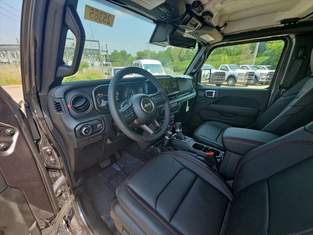 Photo of 2025 Granite Crystal Metallic Clearcoat Jeep Wrangler