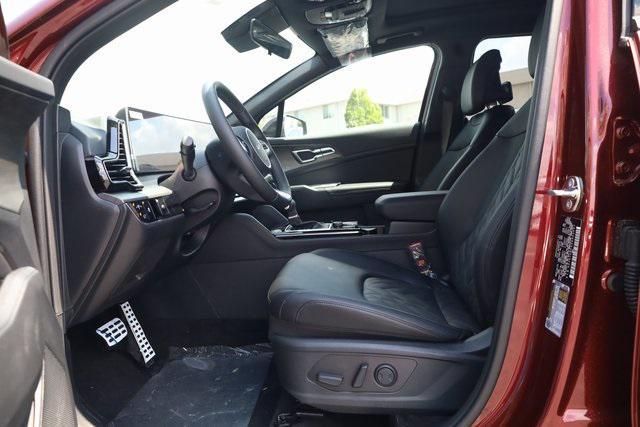Photo of 2025 Dawning Red Kia Sportage