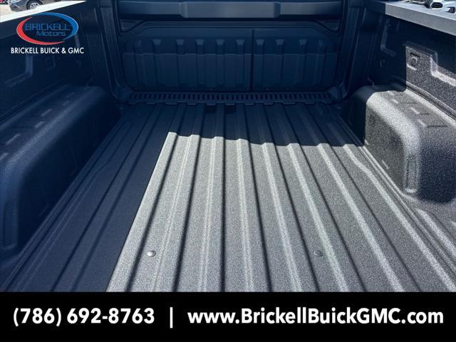 Photo of 2025 Summit White GMC Sierra EV