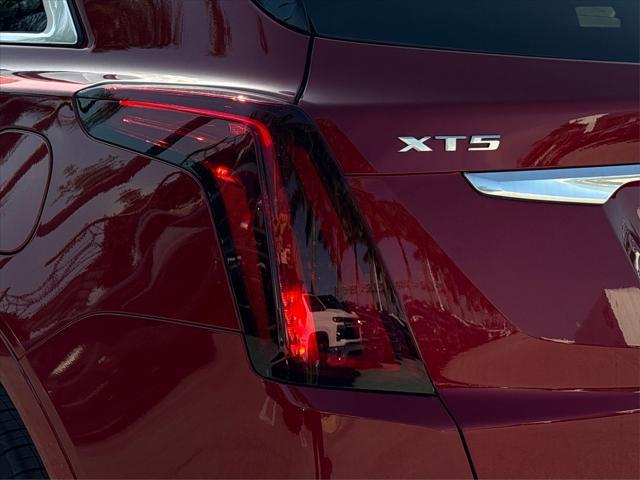 Photo of 2025 Radiant Red Tintcoat Cadillac XT5