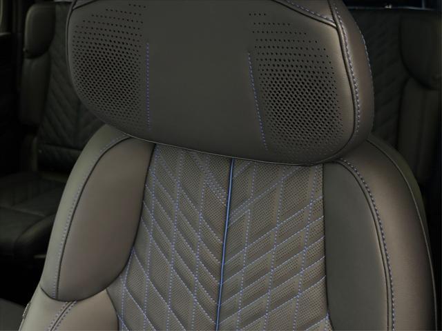 Photo of 2026 Black Raven Cadillac Escalade IQ