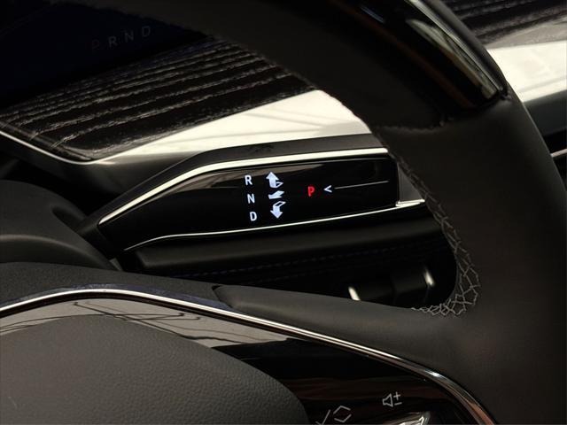 Photo of 2026 Black Raven Cadillac Escalade IQ