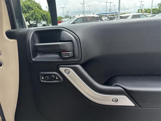 Photo of 2016 Mojave Sand Clearcoat Jeep Wrangler Unlimited