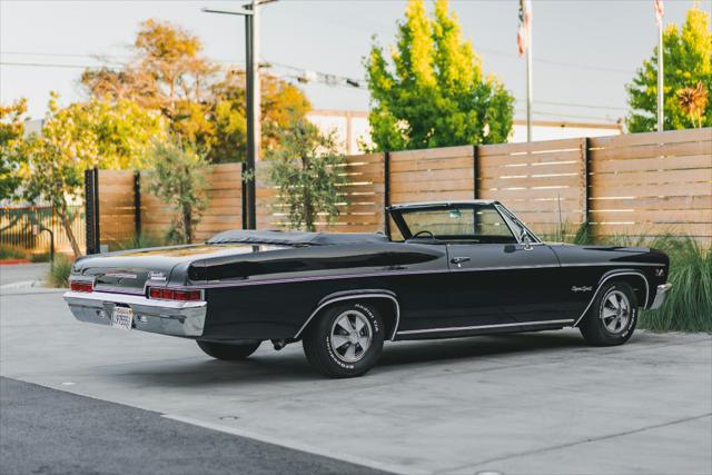 Photo of 1966 Black Chevrolet Impala