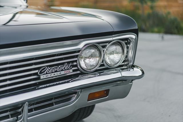 Photo of 1966 Black Chevrolet Impala