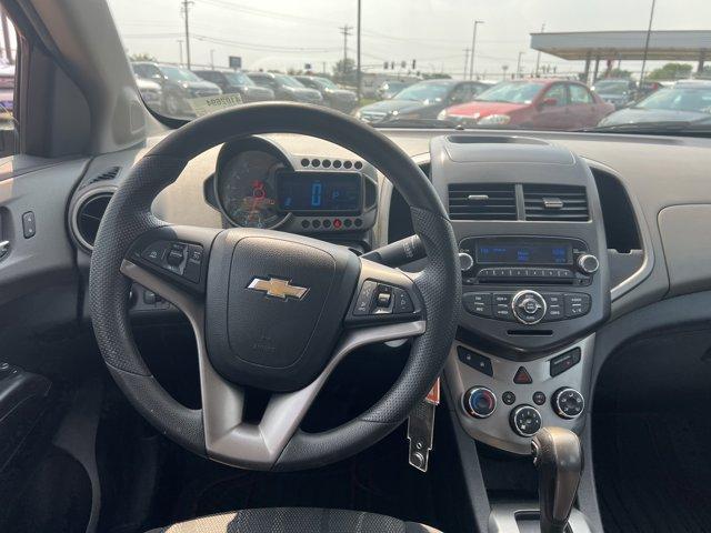 Photo of 2014 Crystal Red Tintcoat Chevrolet Sonic