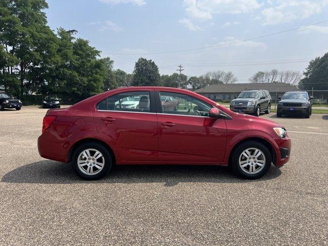 Photo of 2014 Crystal Red Tintcoat Chevrolet Sonic