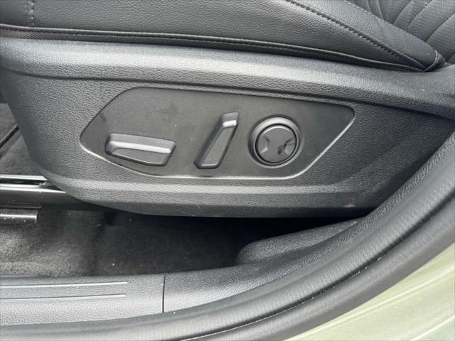 Photo of 2025 Jungle Green Kia Sportage