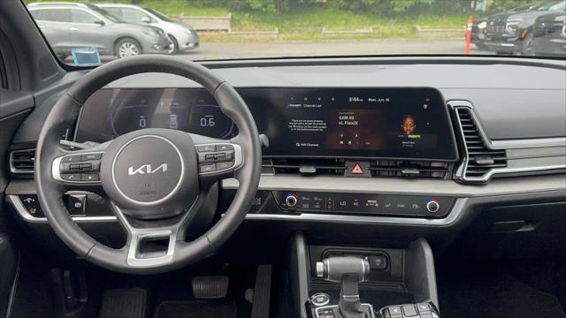 Photo of 2025 Jungle Green Kia Sportage