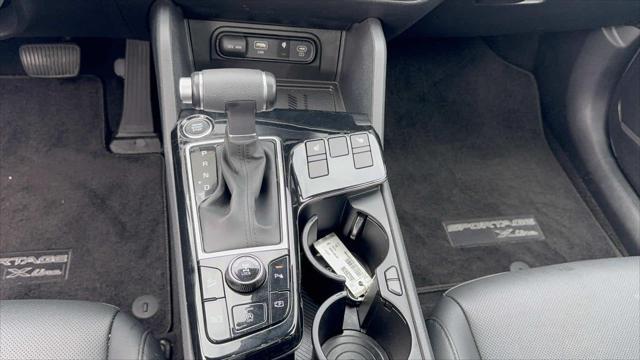 Photo of 2025 Jungle Green Kia Sportage