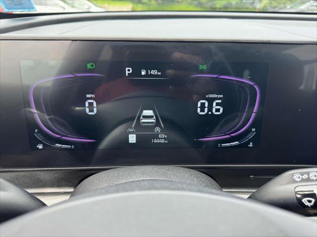 Photo of 2025 Jungle Green Kia Sportage