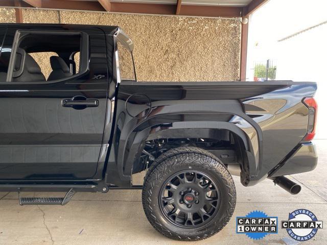 Photo of 2025 Black Toyota Tacoma