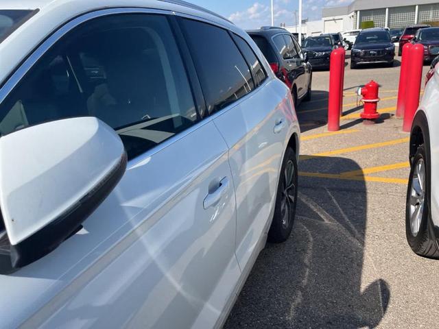 Photo of 2023 Glacier White Metallic Audi Q5