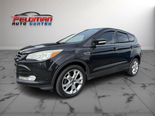 Photo of 2013 Tuxedo Black Ford Escape