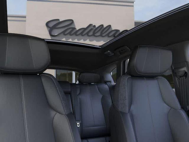Photo of 2025 Radiant Red Tintcoat Cadillac OPTIQ