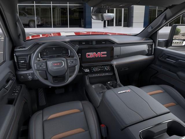 Photo of 2025 Volcanic Red Tintcoat GMC Sierra 2500