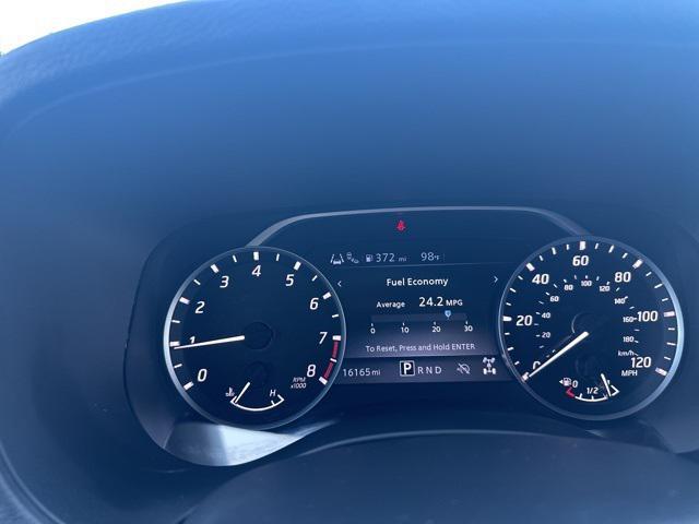Photo of 2024 Glacier White Nissan Frontier