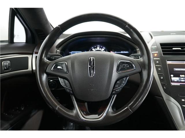 Photo of 2016 Confidential White Lincoln MKZ Hybrid