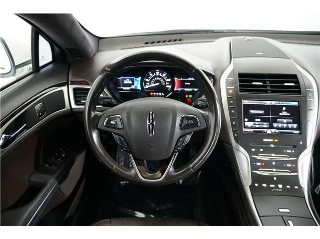 Photo of 2016 Confidential White Lincoln MKZ Hybrid