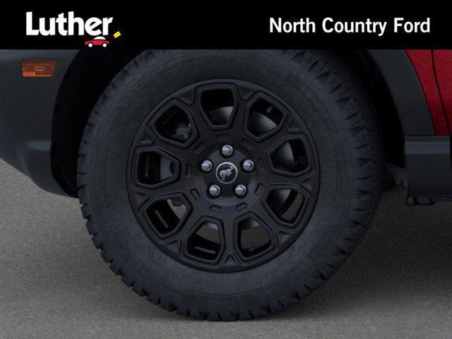 Photo of 2025 Ruby Red Metallic Tinted Clearcoat Ford Bronco Sport