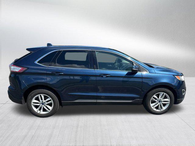 Photo of 2017 Blue Jeans Metallic Ford Edge