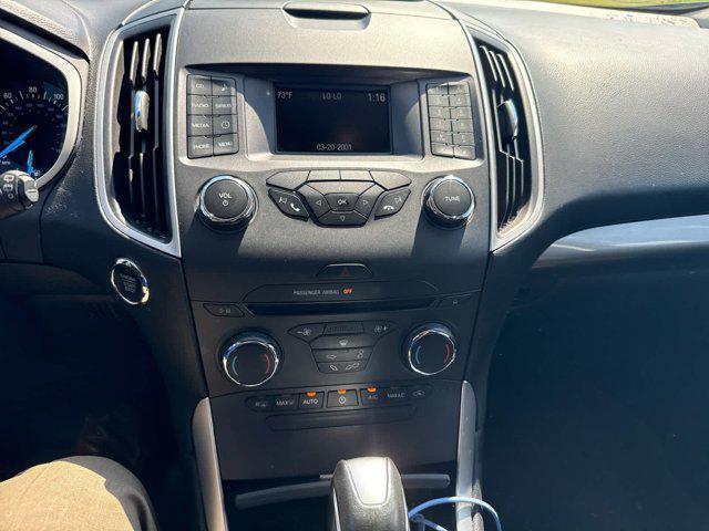 Photo of 2017 Blue Jeans Metallic Ford Edge