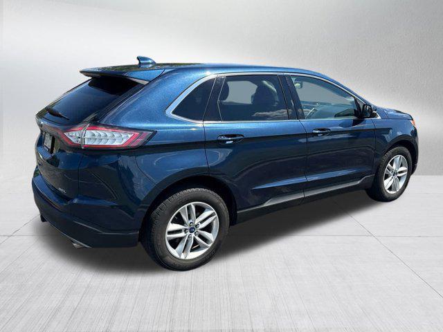 Photo of 2017 Blue Jeans Metallic Ford Edge