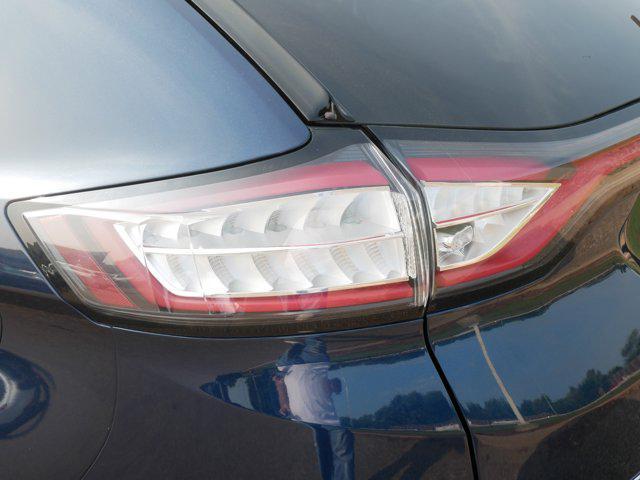 Photo of 2017 Blue Jeans Metallic Ford Edge