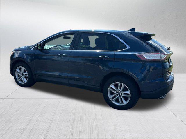 Photo of 2017 Blue Jeans Metallic Ford Edge