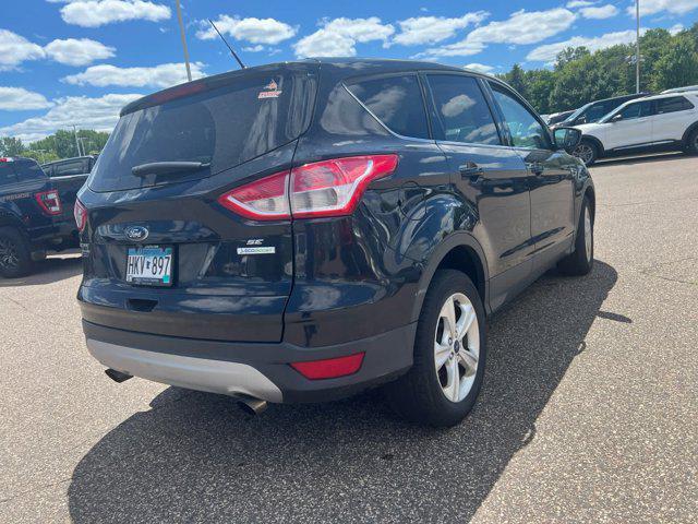 Photo of 2015 Tuxedo Black Ford Escape
