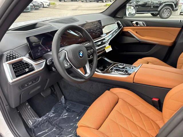 Photo of 2026 Mineral White BMW X5 PHEV