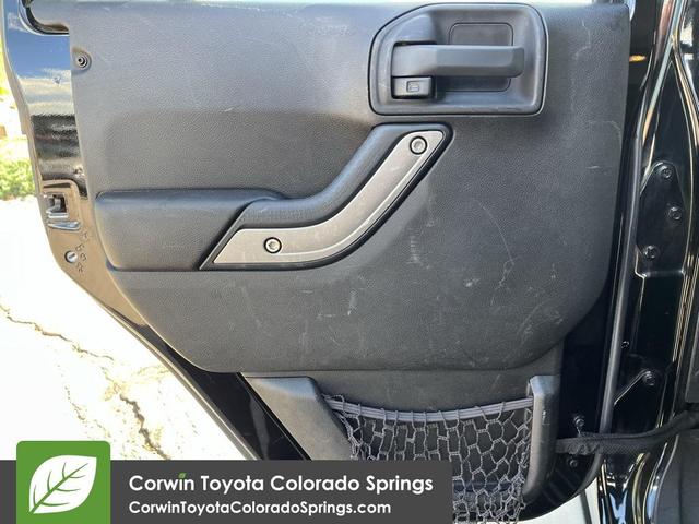 Photo of 2015 Black Clearcoat Jeep Wrangler Unlimited