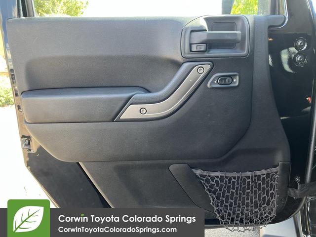 Photo of 2015 Black Clearcoat Jeep Wrangler Unlimited