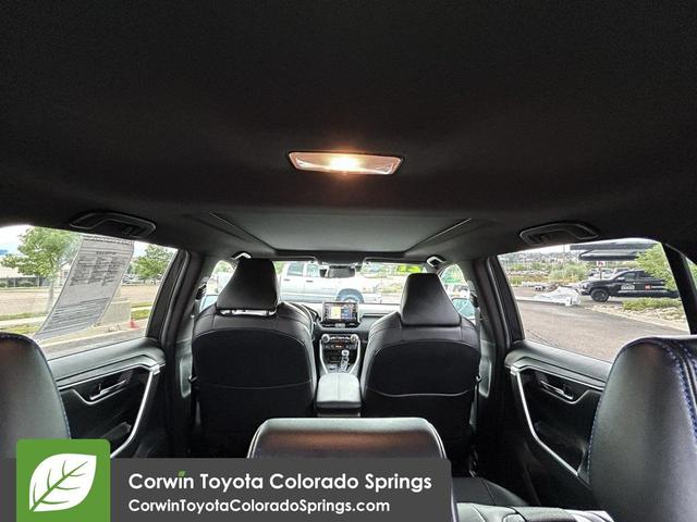 Photo of 2021 Blizzard Pearl/Midnight Black Metallic Toyota RAV4 Hybrid