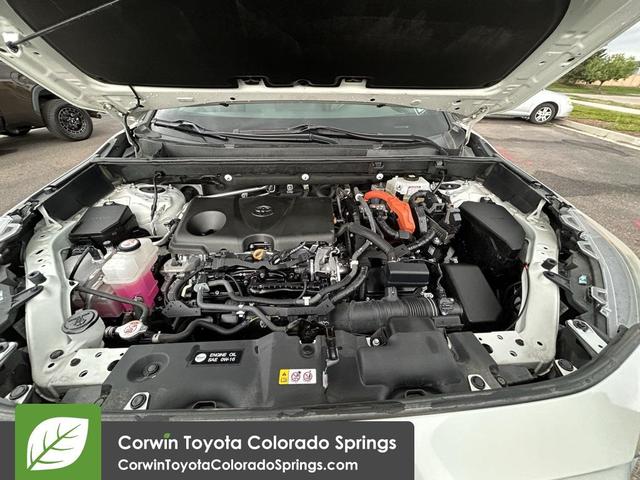 Photo of 2021 Blizzard Pearl/Midnight Black Metallic Toyota RAV4 Hybrid