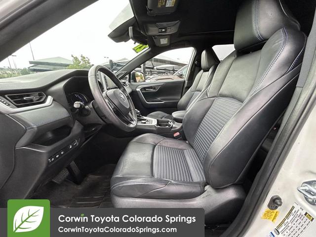 Photo of 2021 Blizzard Pearl/Midnight Black Metallic Toyota RAV4 Hybrid