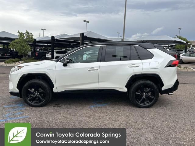Photo of 2021 Blizzard Pearl/Midnight Black Metallic Toyota RAV4 Hybrid