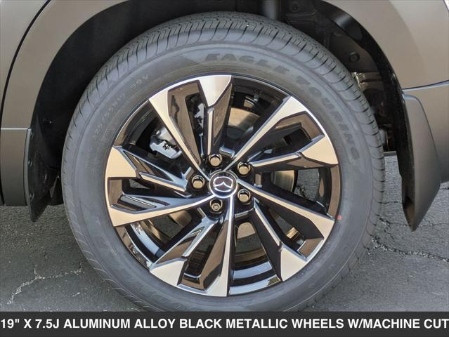 Photo of 2025 Wind Chill Pearl Mazda CX-50 Hybrid