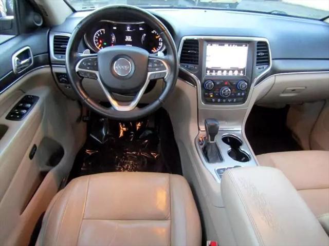 Photo of 2016 Burgundy Jeep Grand Cherokee